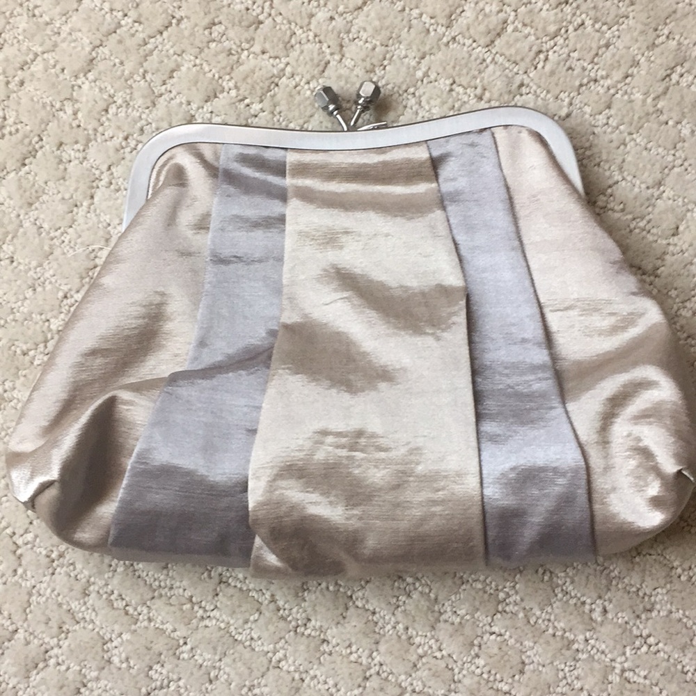 Silver and gold clutch with gemstone clasp